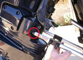 Recessed flange bolt heads on Evinrude. Use bottom set.