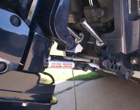 Transom mount idents on Evinrude. Guide rounded ends under pin and into indents when installing.