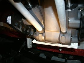 Motor mount indents on Mercury. Adjust up close to main cylinder housing.