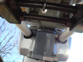 Cupped ends of the Lock-n-Haul can access the bolt heads through the holes in the plastic cowling